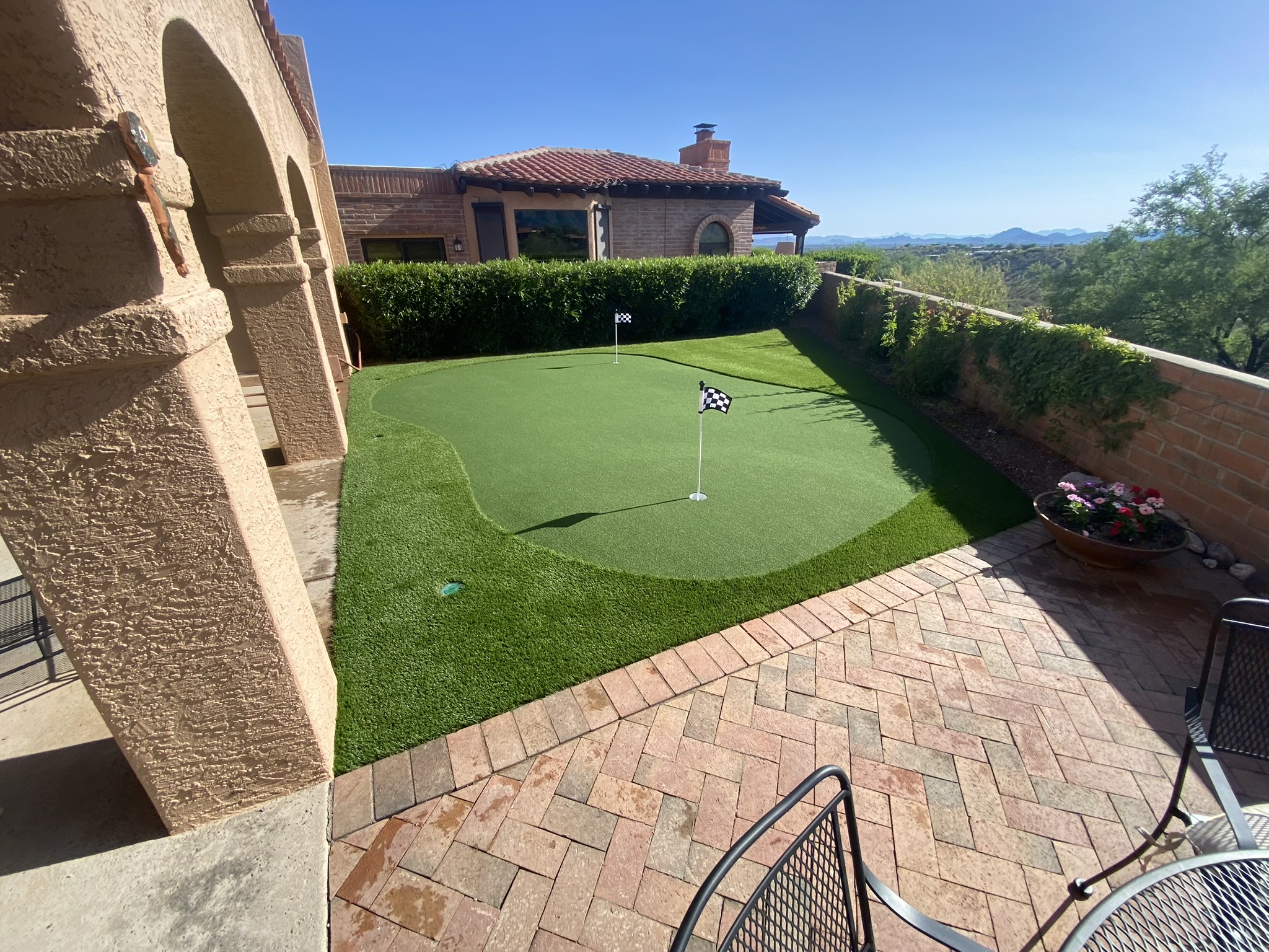Custom putting green with mountain views